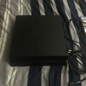 Sony ps4 with 5 games and controllers