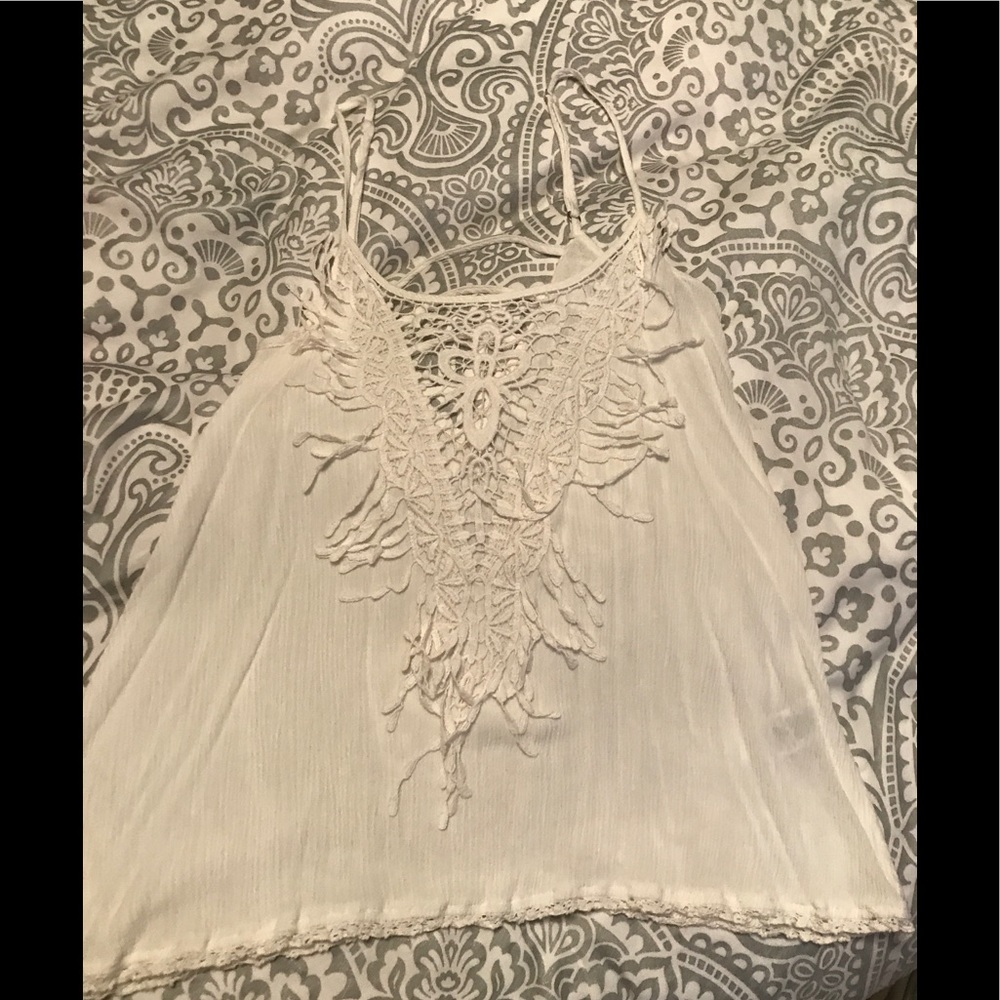 White top with lace center.