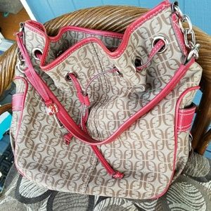 Fossil red and tan hand bag