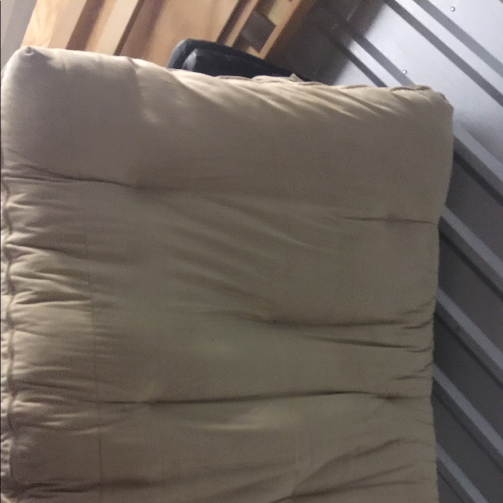 Queen futon with beige cover light frame