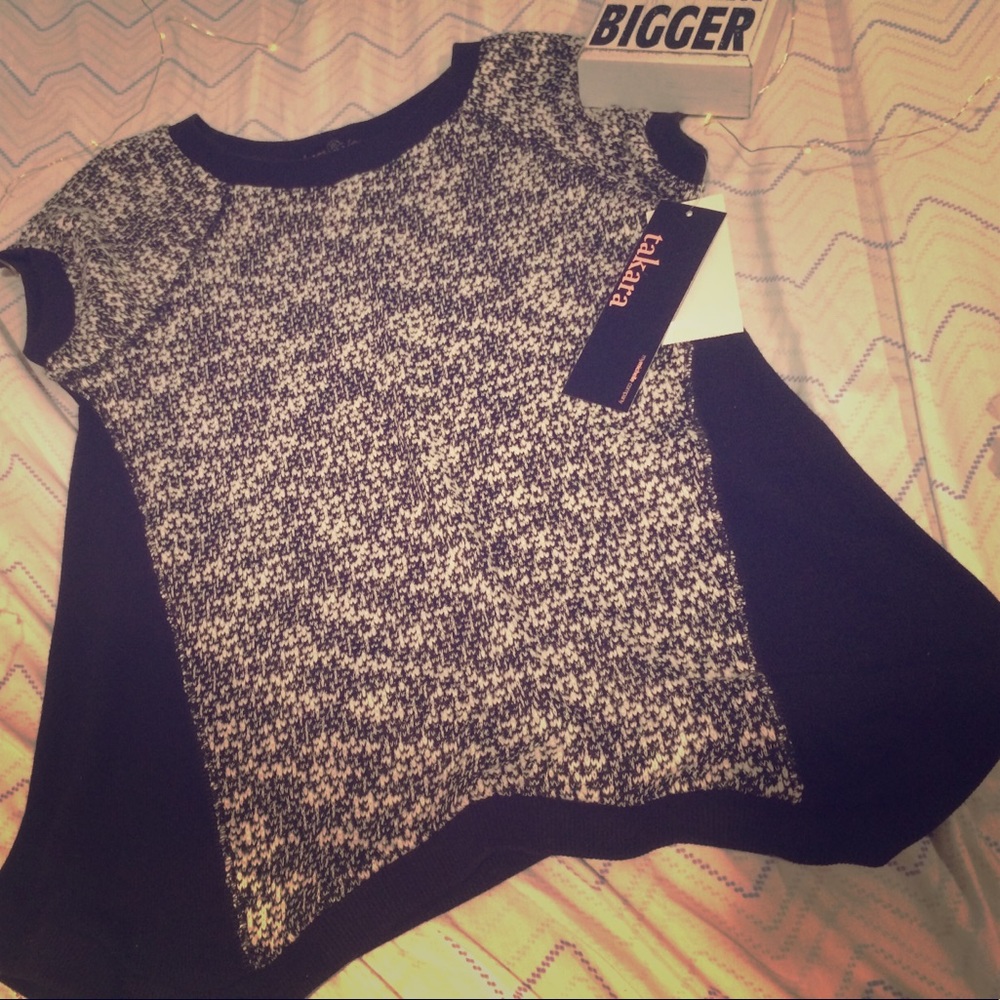 This is a black and white top.