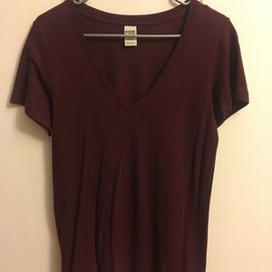 Pink. Maroon V-neck.