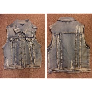Jean vest . Worn once. Goes great with a dress!!!