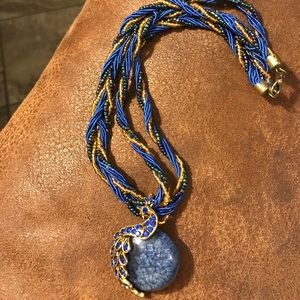 Peacock necklace.