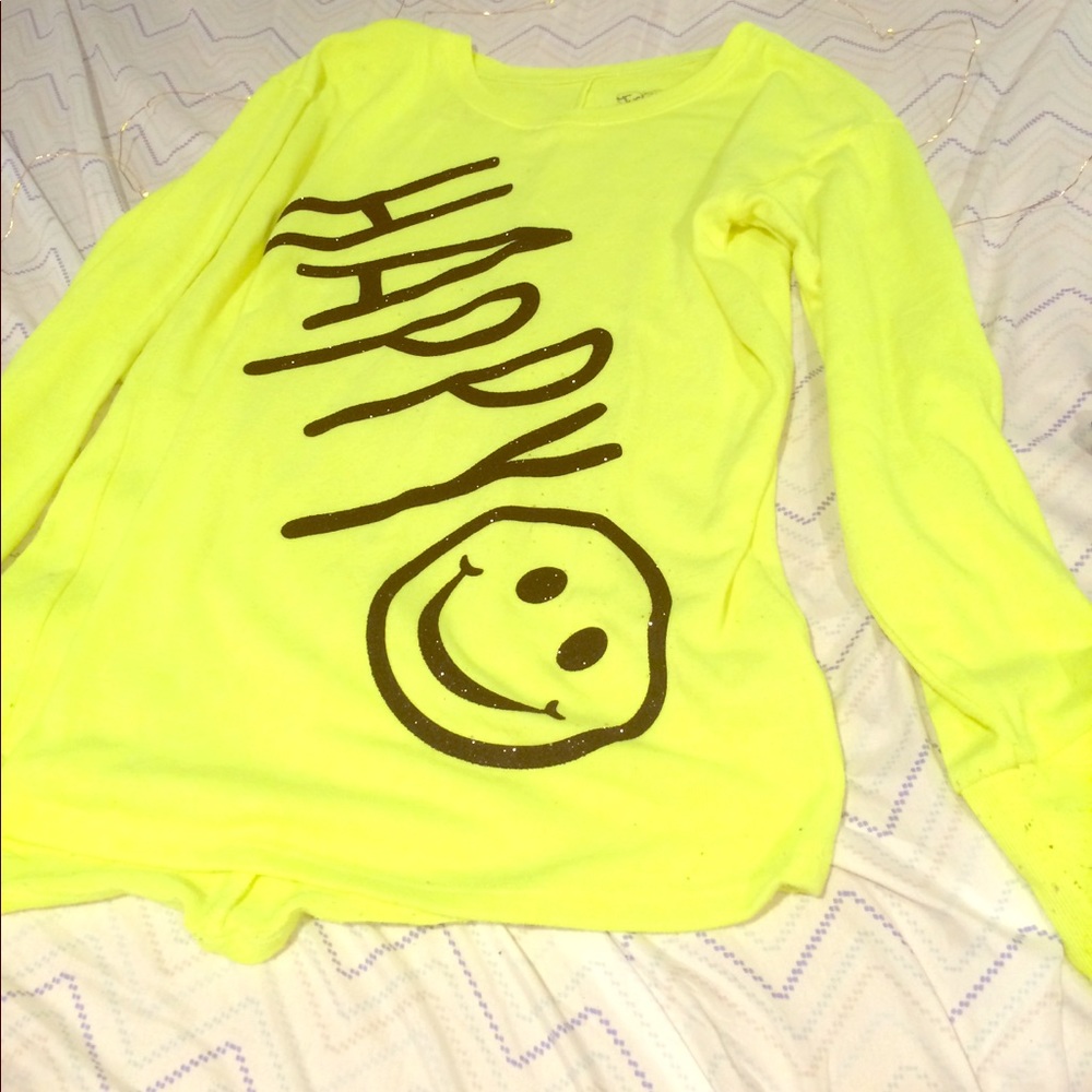 This is just a bright neon yellow happy shirt.