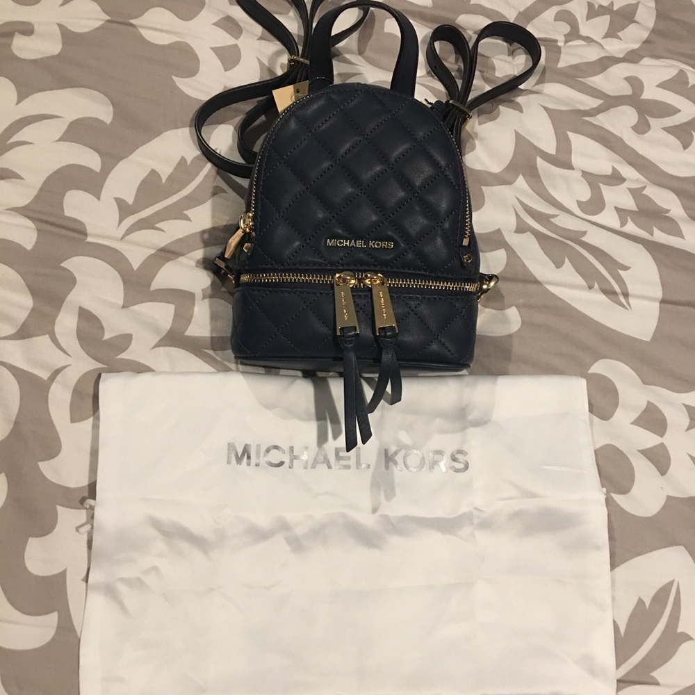 **SOLD**MK Rhea XS Zip Quilted Messenger Backpack