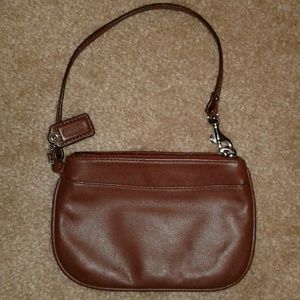Coach - chocolate Brown smooth leather wristlet