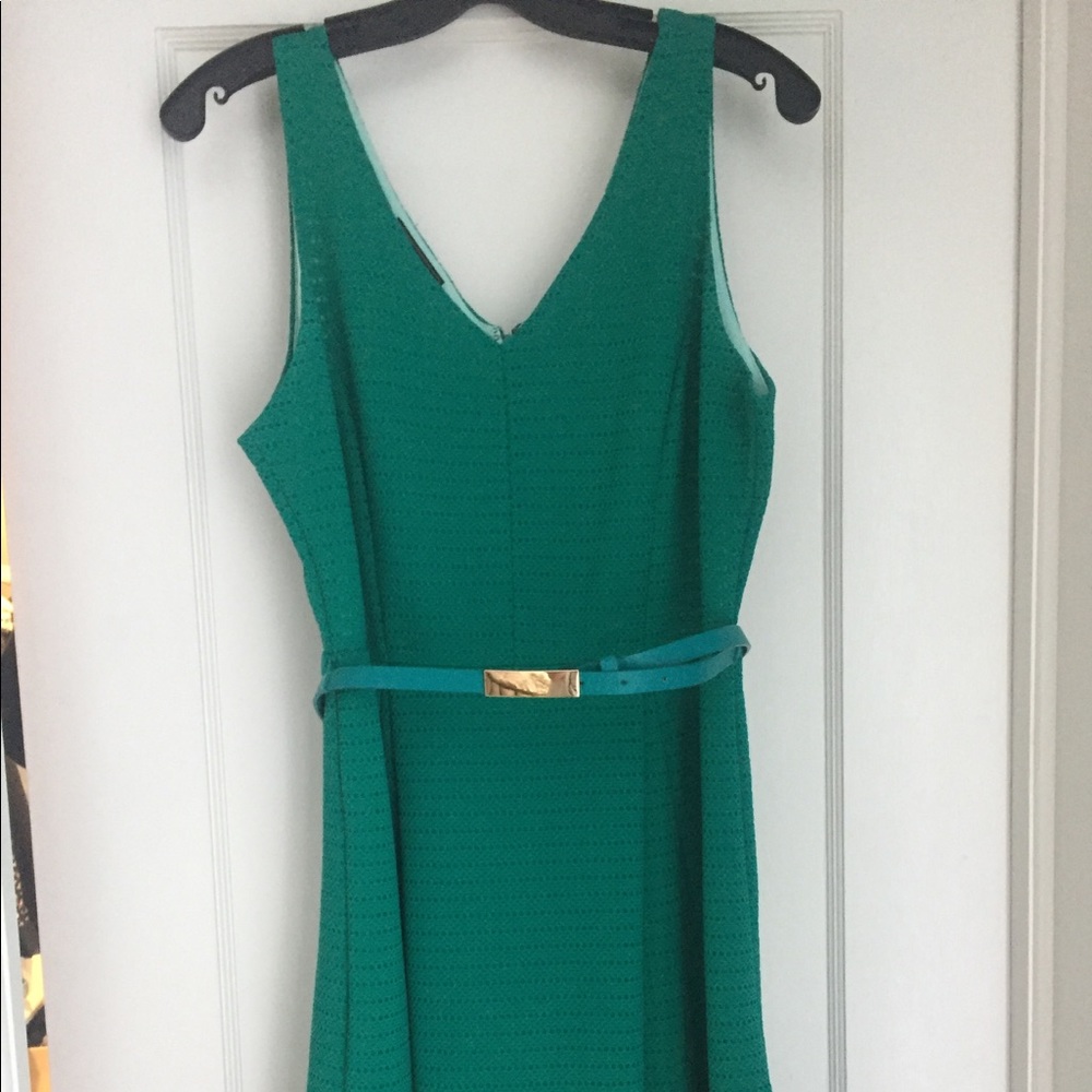 Belted green dress