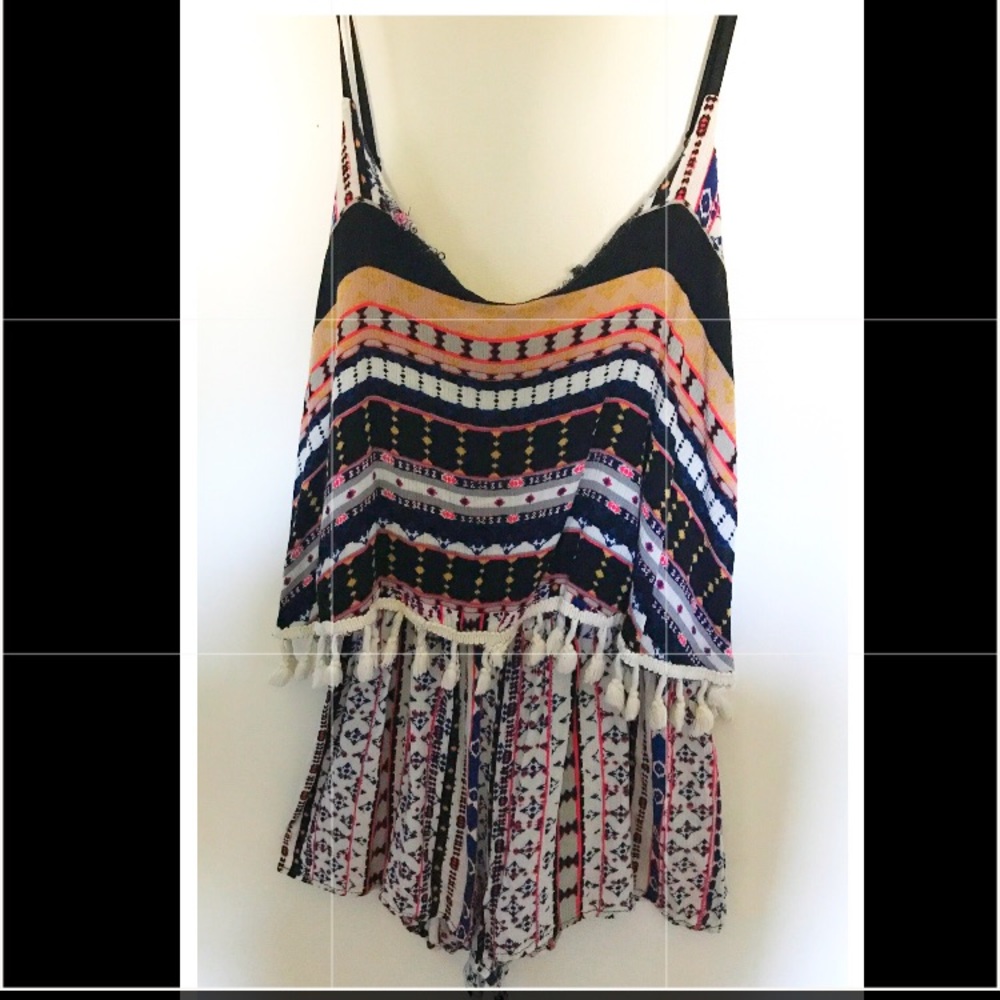 Romper with thin straps.