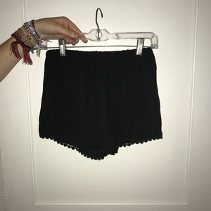 Black shorts with scalloped bottom