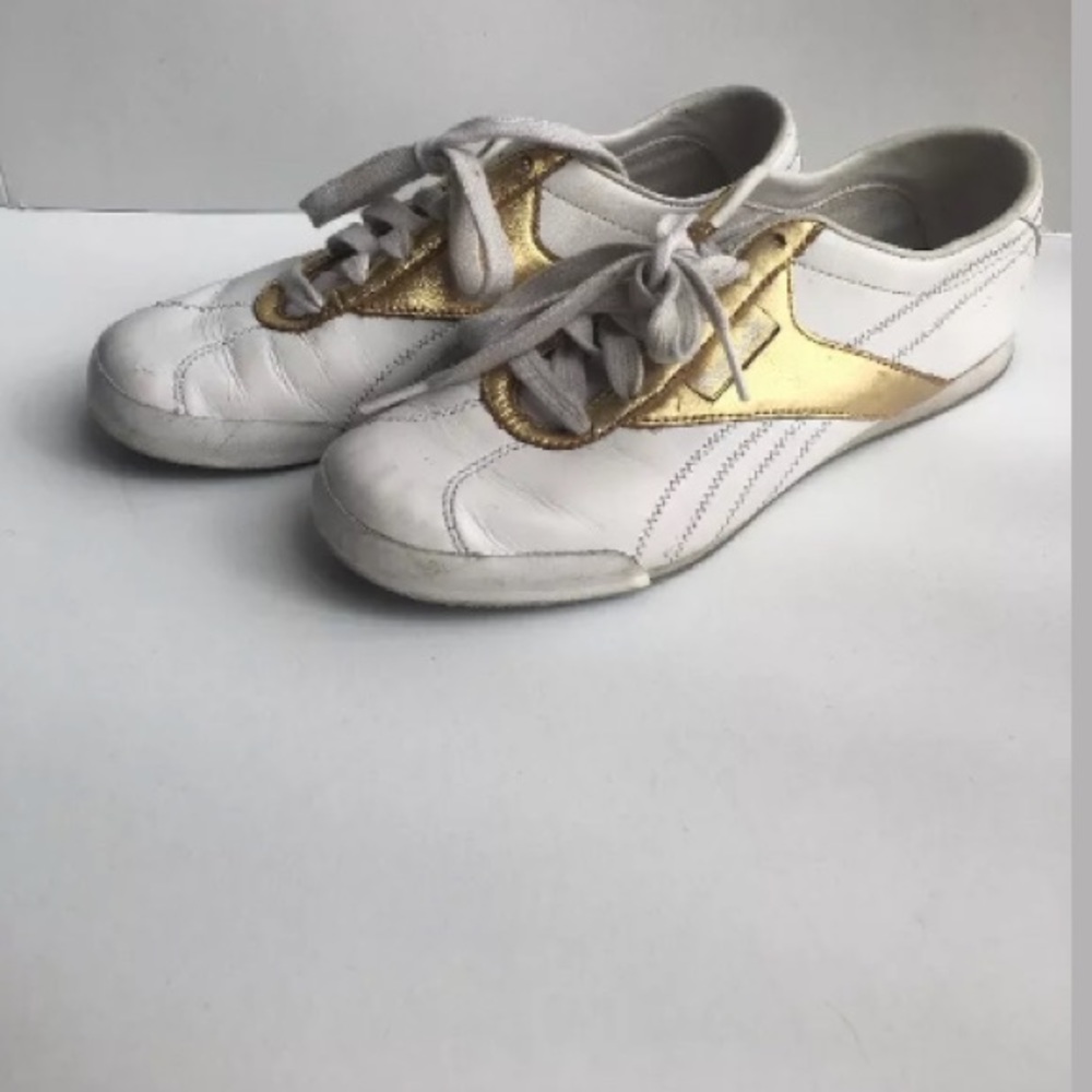 Vintage gold and white Reebok sneakers