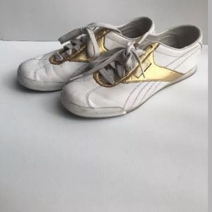 Vintage gold and white Reebok sneakers