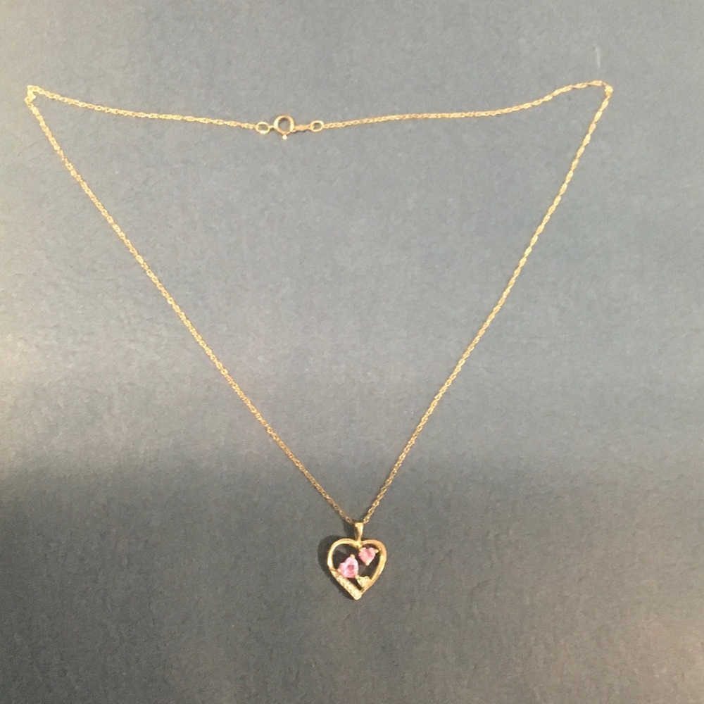 14k Gold necklace. Pink sapphire & diamond accent.