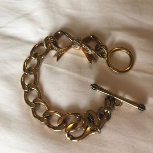 Juicy couture gold bow rhinestone bracelet