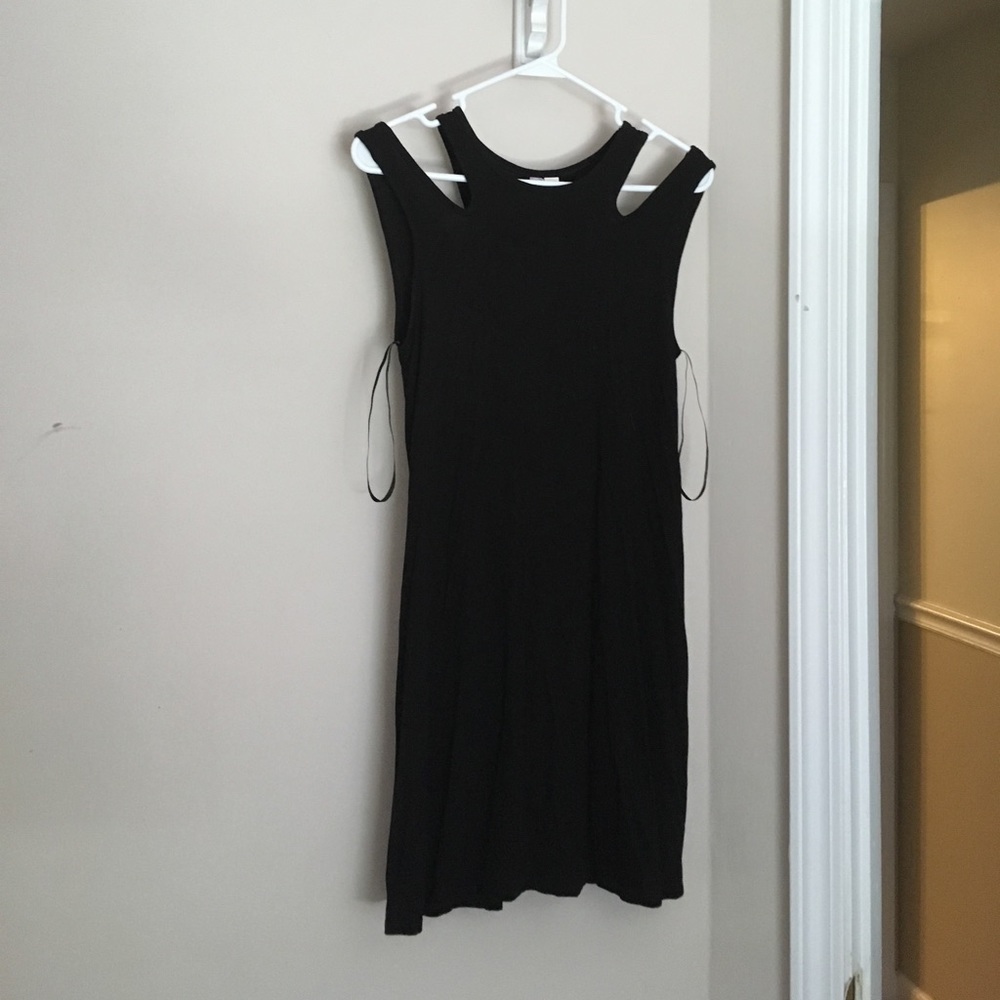 Two strapped (one shoulder) black silky dress