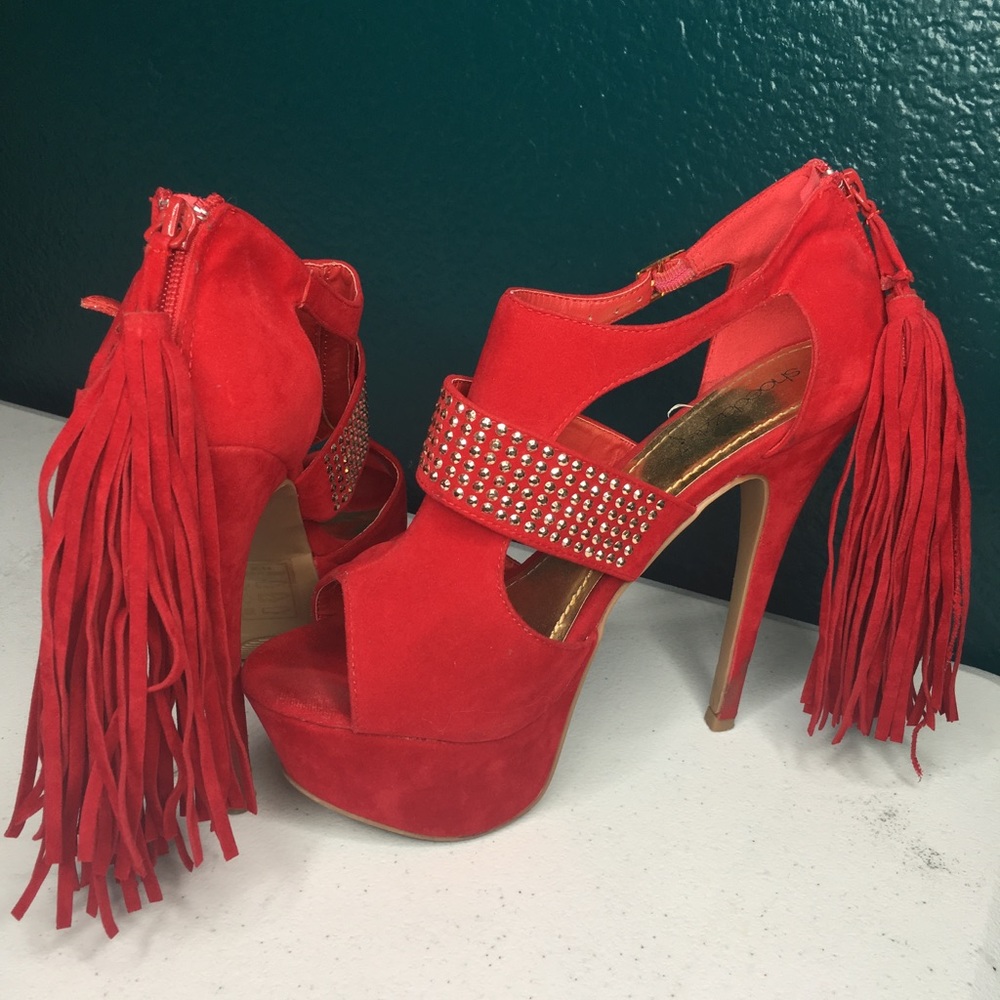 Red heels with tassels
