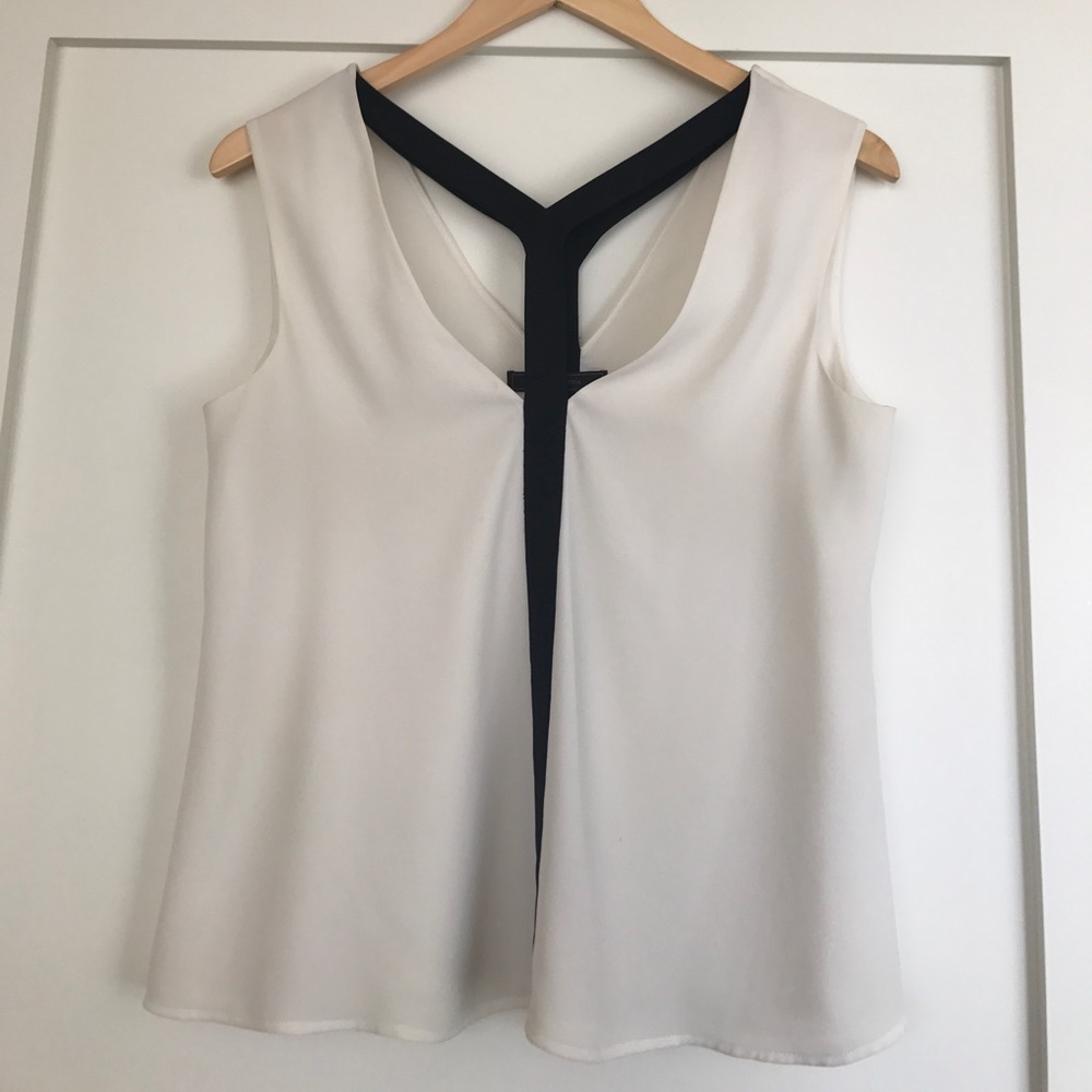 Beautiful black and white sleeveless blouse