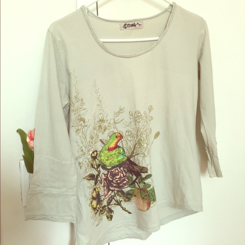 Shirt with a budgerigar print