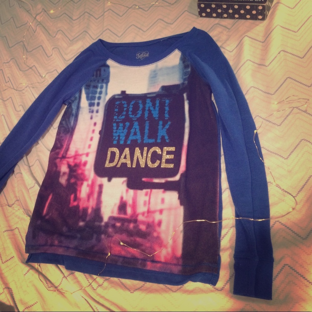 This is a blue long sleeved shirt.