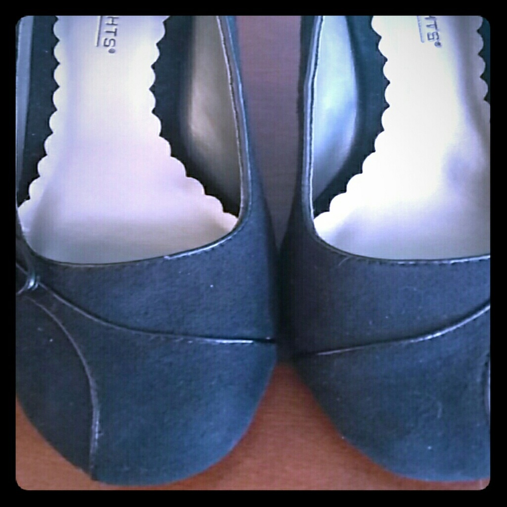 Black suede pumps