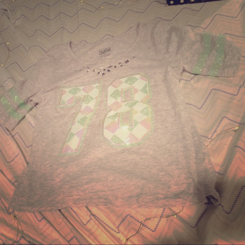 This is a gray 78 T-shirt and it matches the skirt