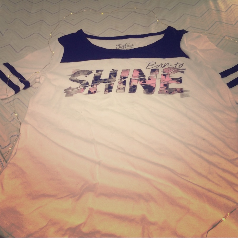 This is a white and black born to shine T-shirt.