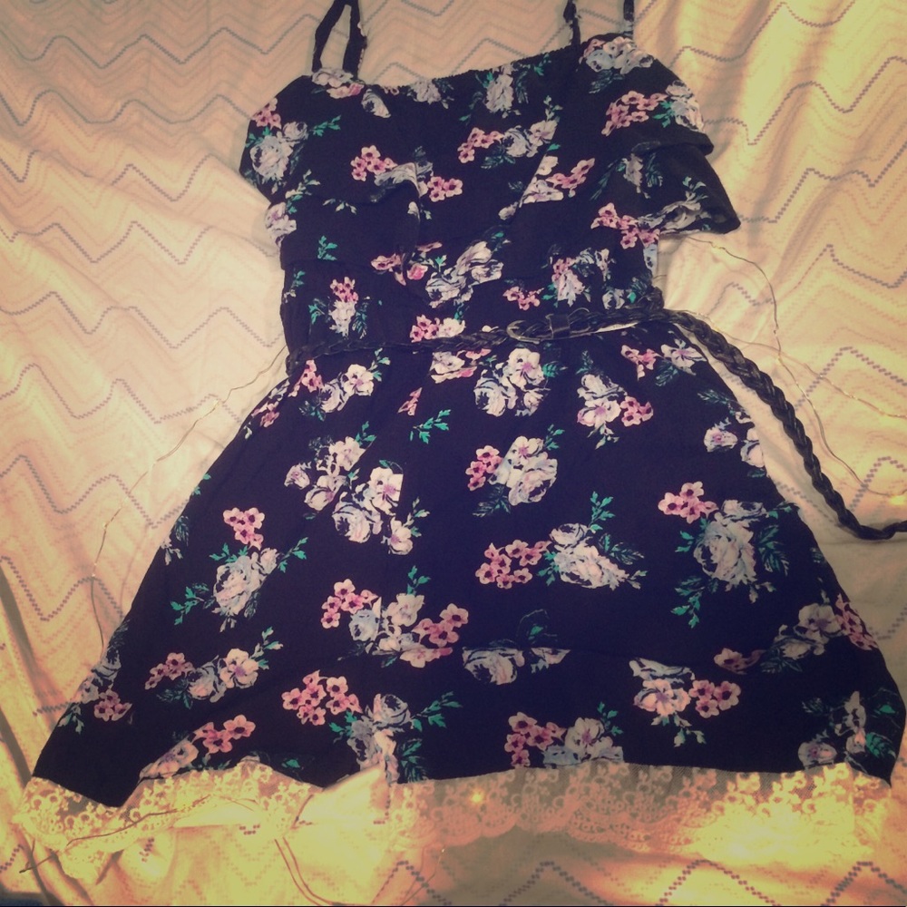 This is a black floral romper.