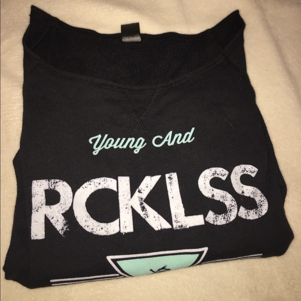 Young and reckless sweater