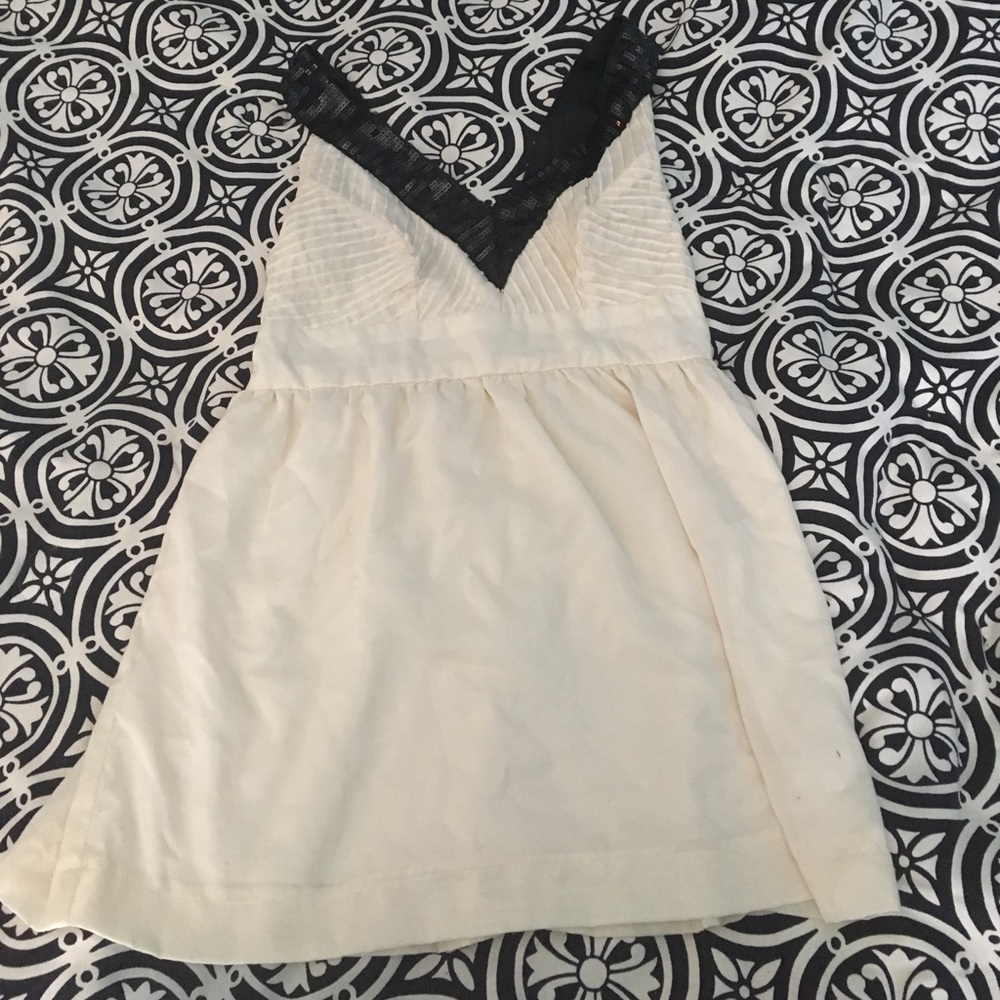 Delias cream and black top