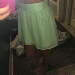 Sea green short flow skirt