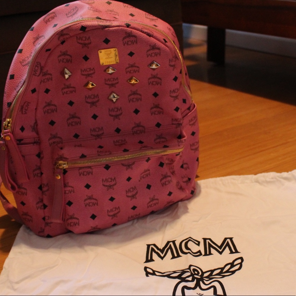 Pink MCM medium size 6 studded backpack authentic