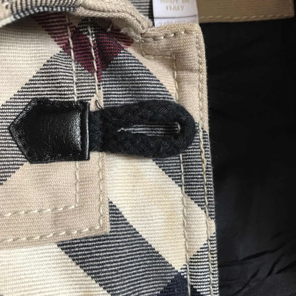 Burberry jacket has stains!