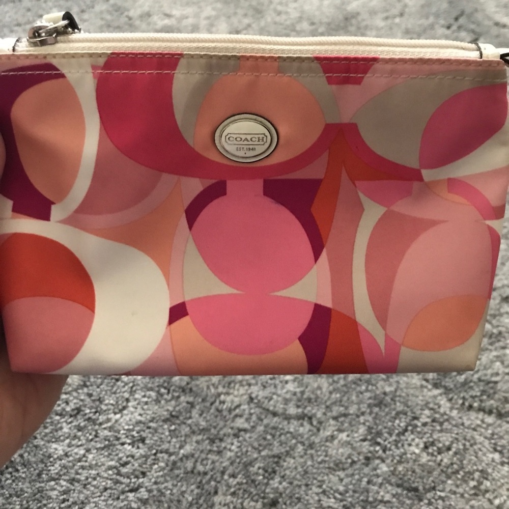 Gently used colorful Coach makeup bag