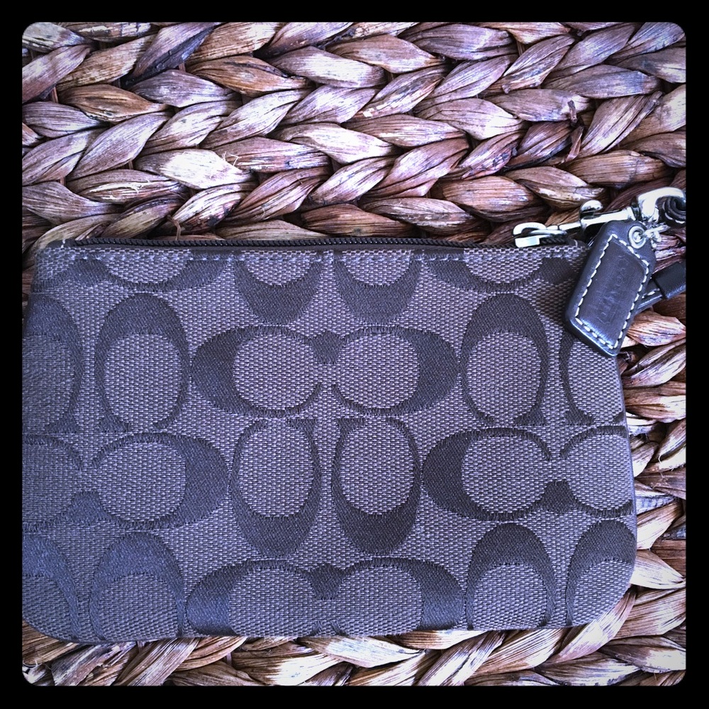 Brown signature Coach wristlet