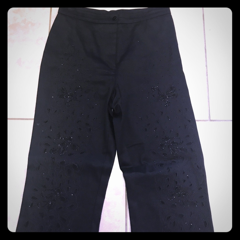 Black beaded trousers. Matches blazer.