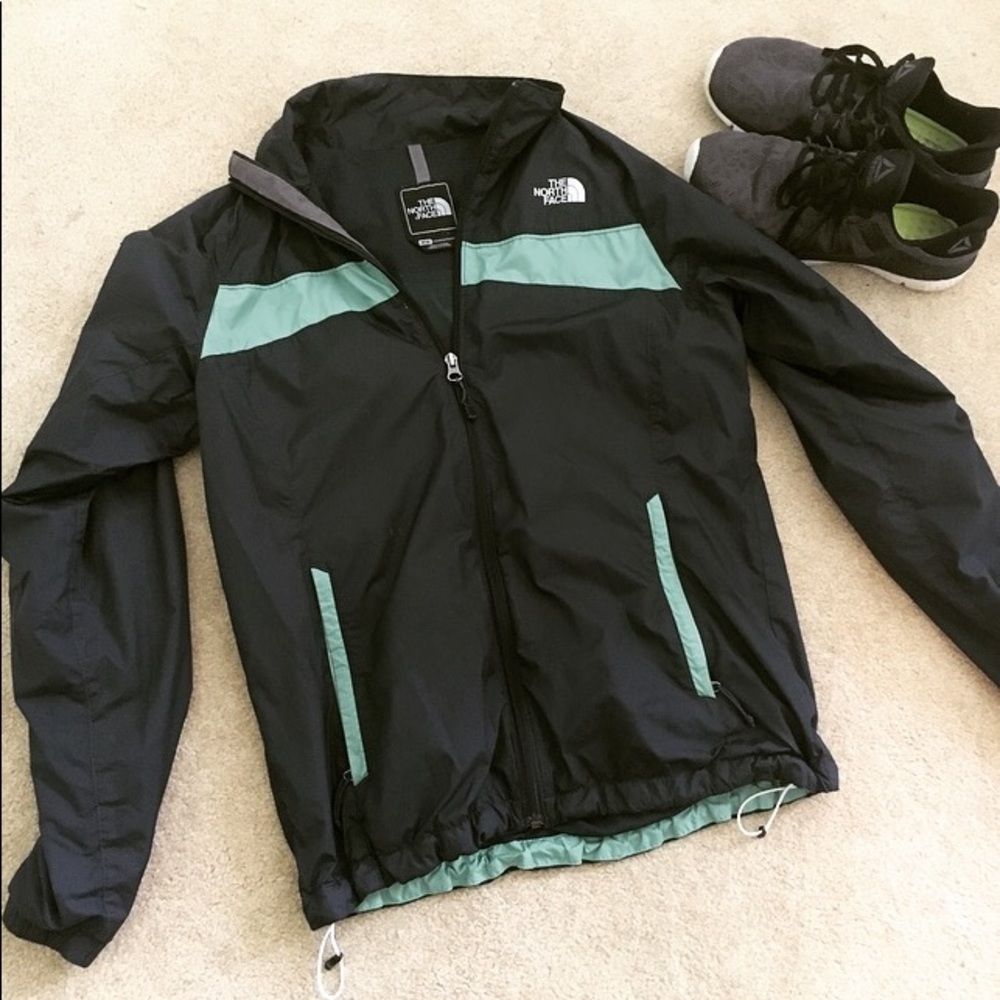 Blue and mint colored north face jacket