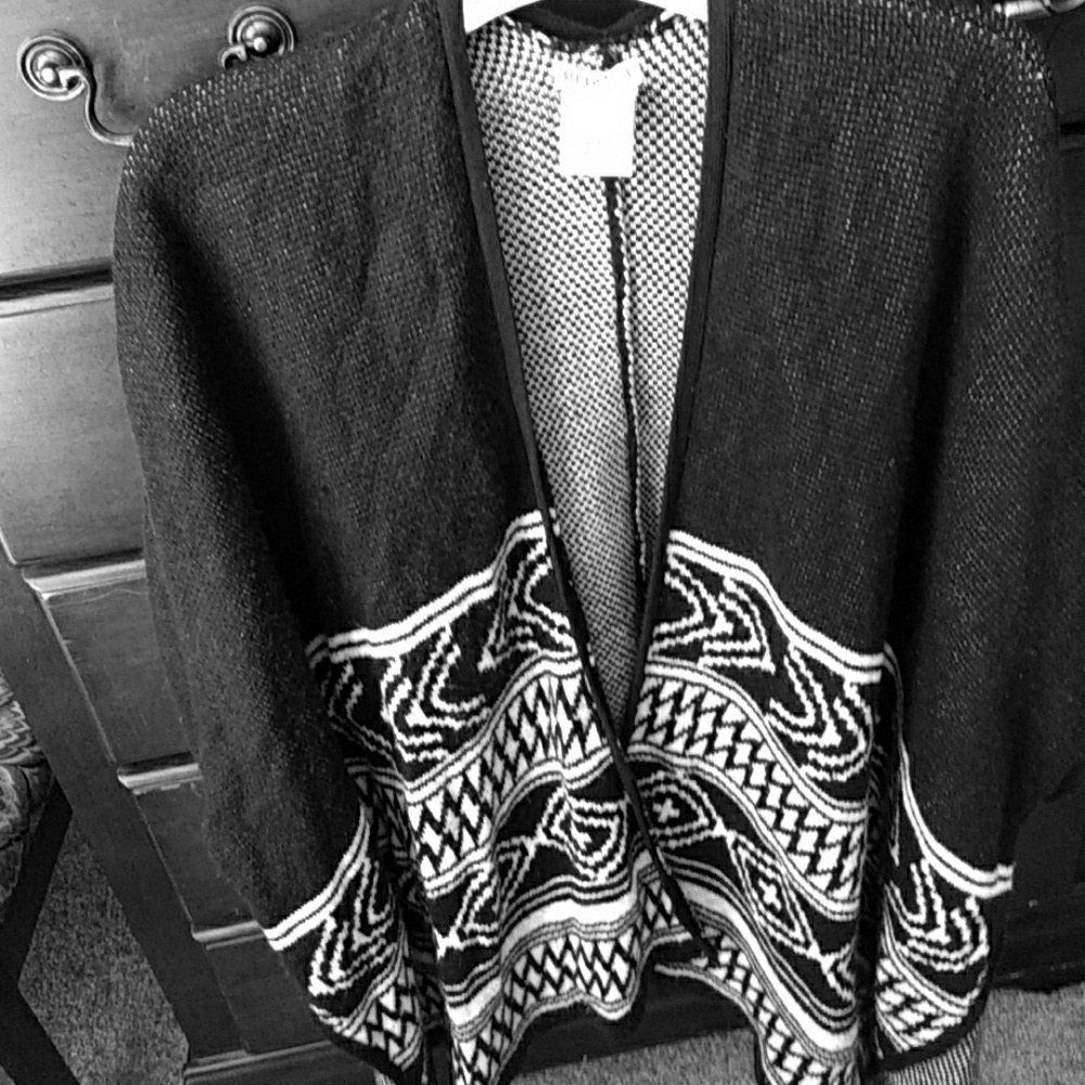 Black poncho with Aztec pattern