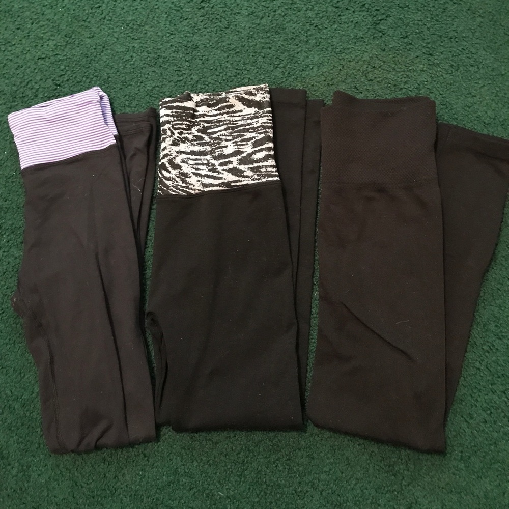Three pair of black leggings.