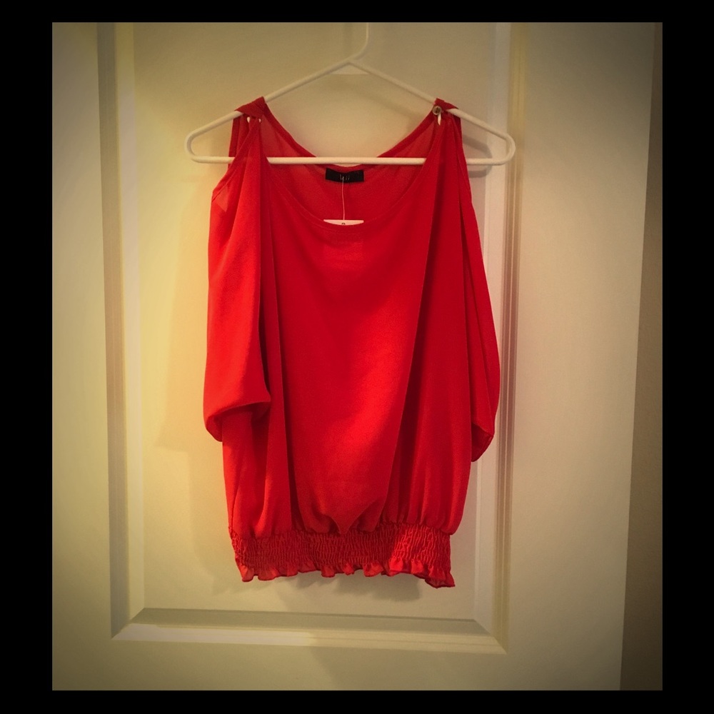 Red Blouse with shoulder cut out and gold buttons