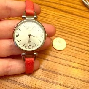 Silver watch with coral band