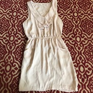 Tan sleeveless dress with pockets