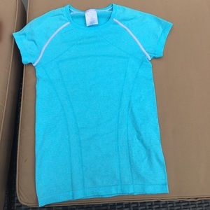 Blue tight short sleeve, never worn