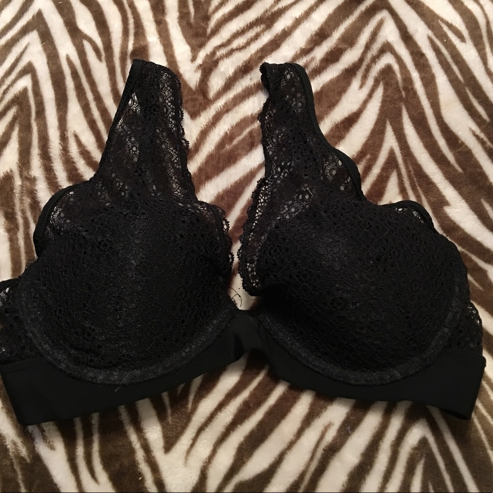 Lightly lined bra. Black lace bralette style.