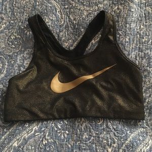 Black and gold sparkly Nike sports bra