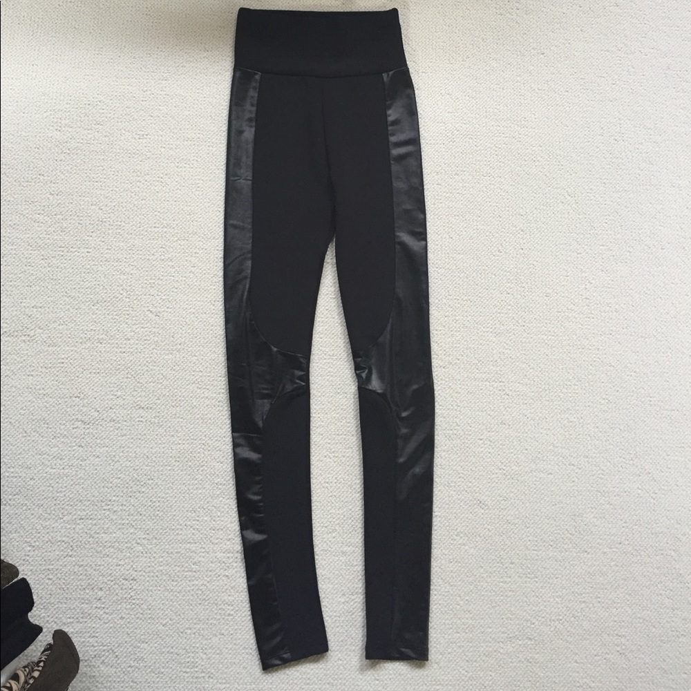 Black leggings with faux leather accent