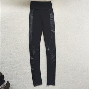 Black leggings with faux leather accent