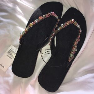 Black beaded flip flops