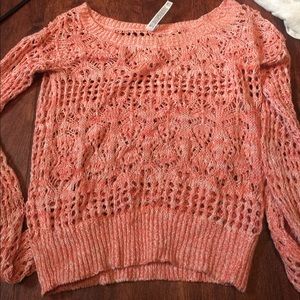 Pink knitted sweater