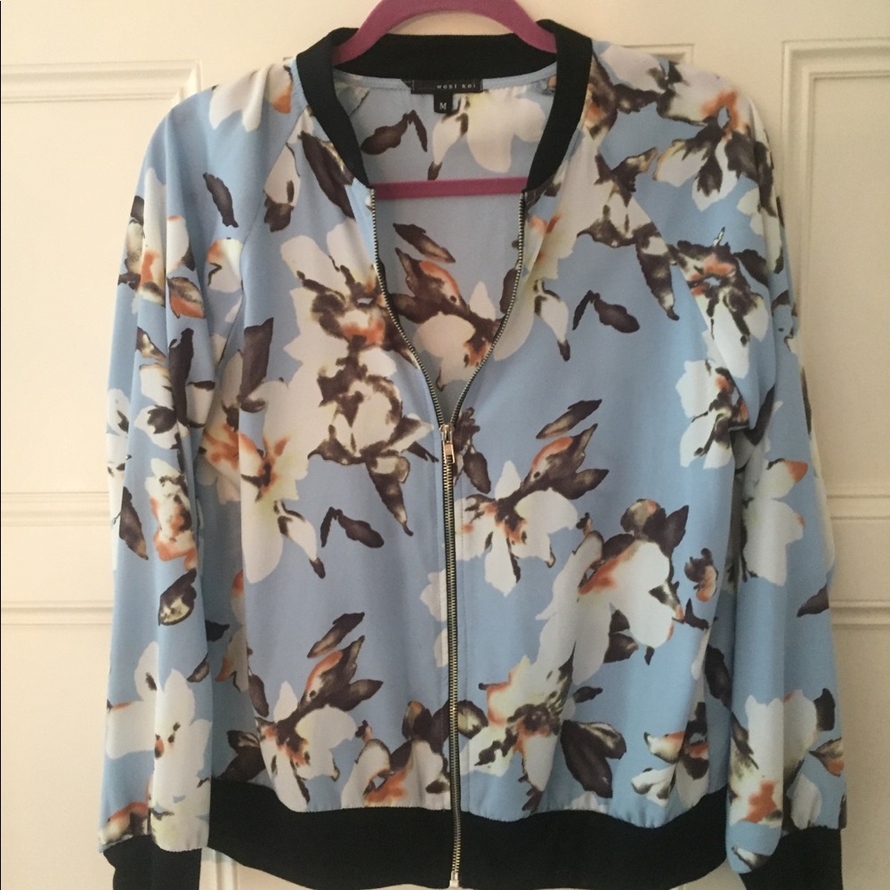 Pretty light zip up jacket Brand New