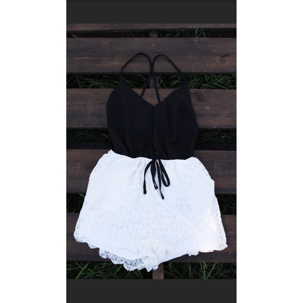 Black Romper with white crochet-knit bottoms